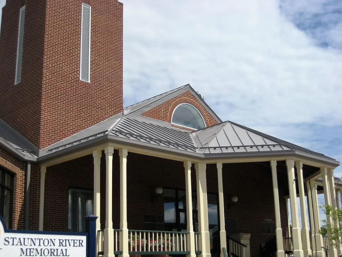 Skilled roofing craftsmen working on a residential roof in Newark
